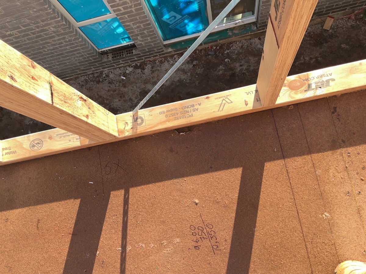 Bottom plate tie down at 1200mm maximum spacing, recorded during a frame inspection in Oran Park